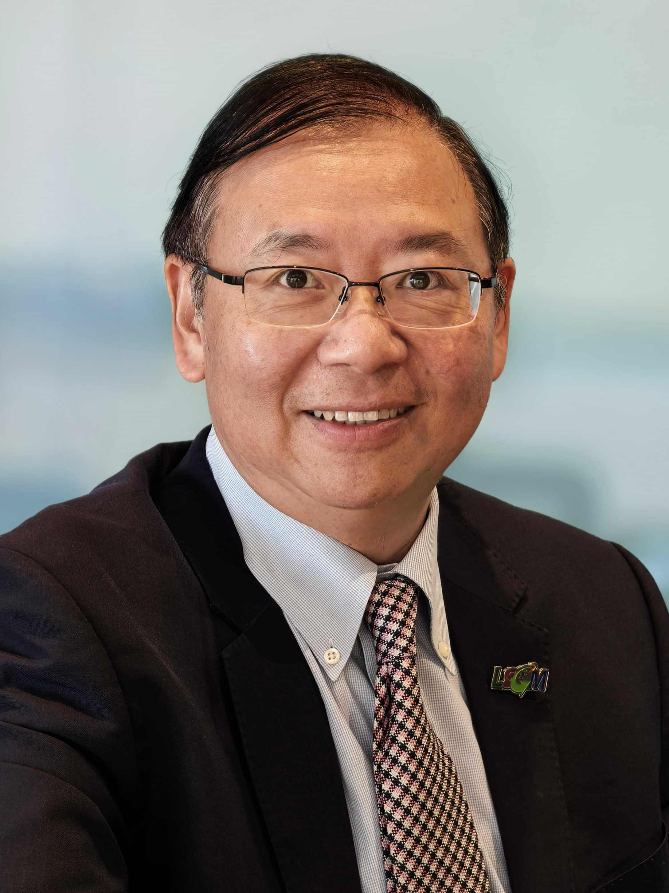 Simon K. Y .Wong